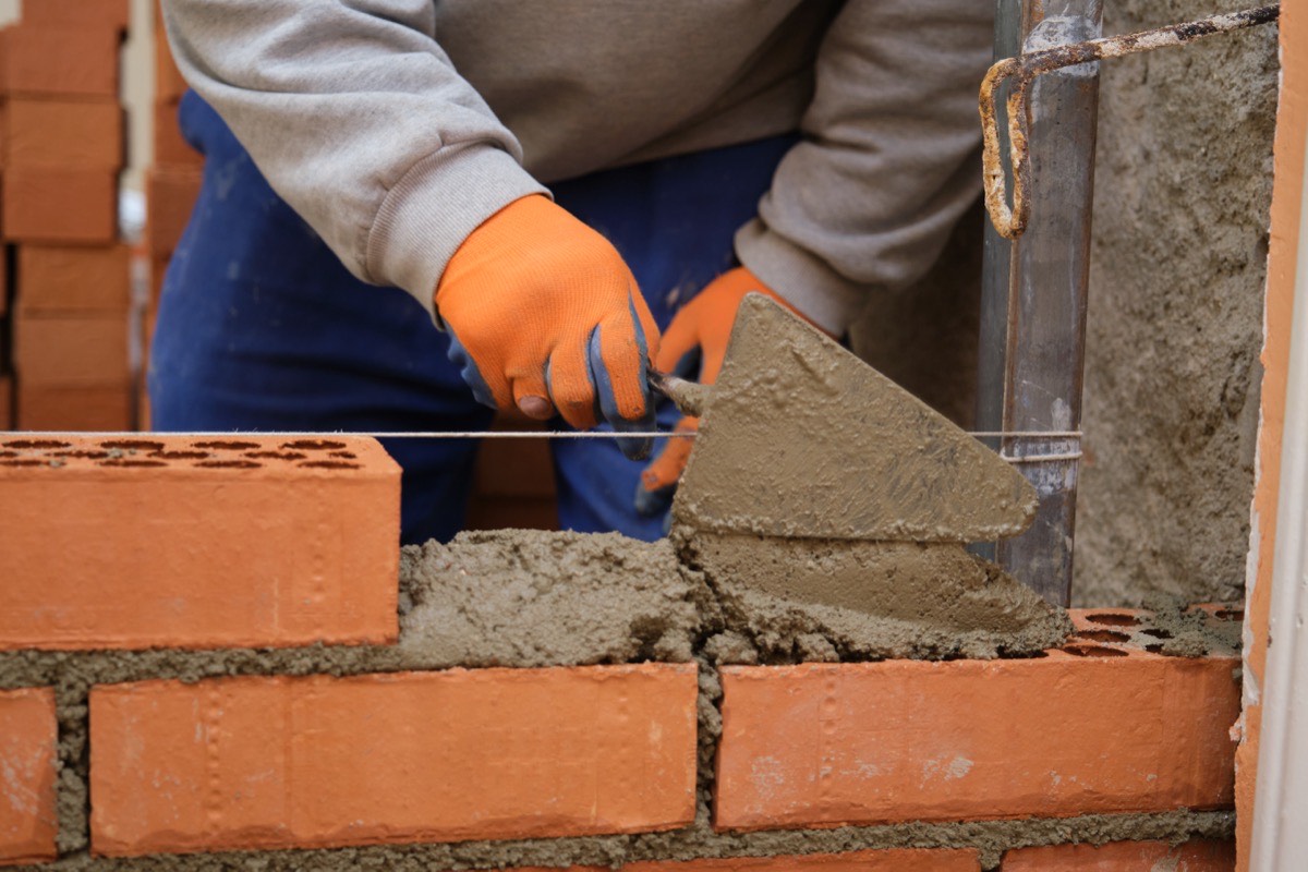 Before and after brick repointing on a pre-1940 house in Catonsville, MD