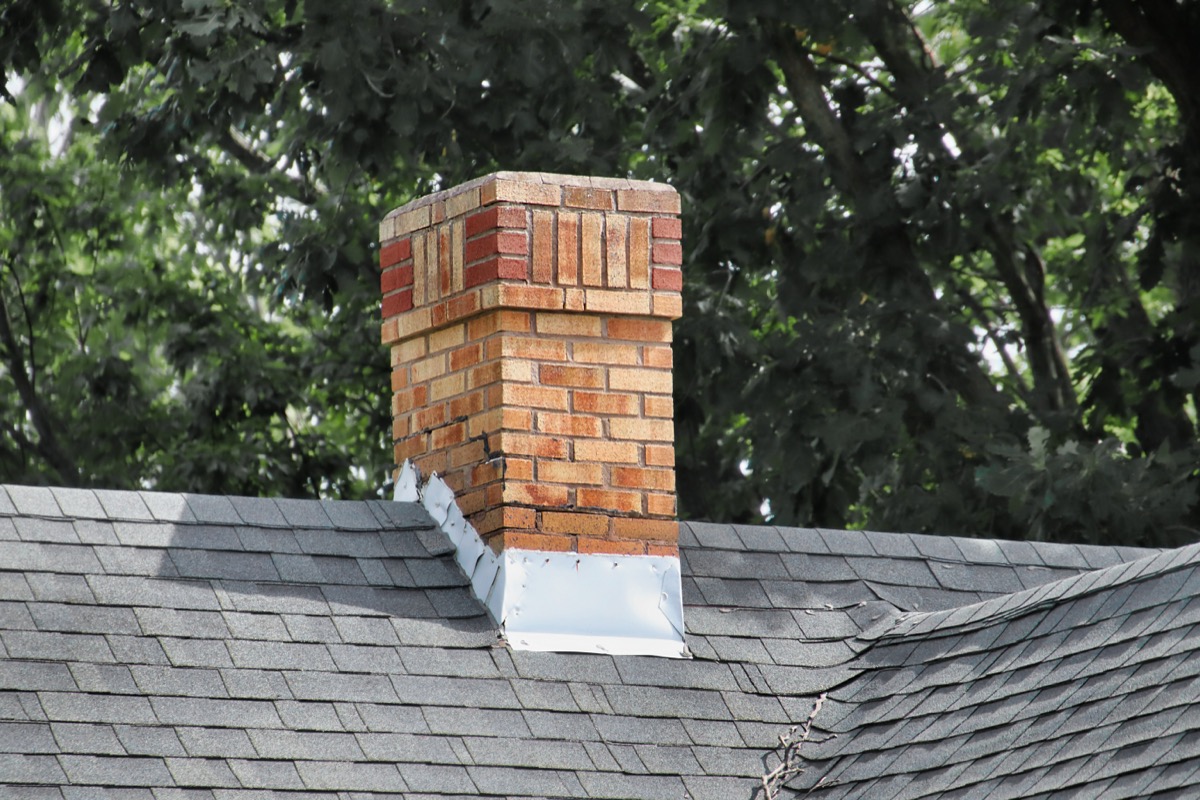Counter-flashing cut into a mortar joint at a Baltimore chimney