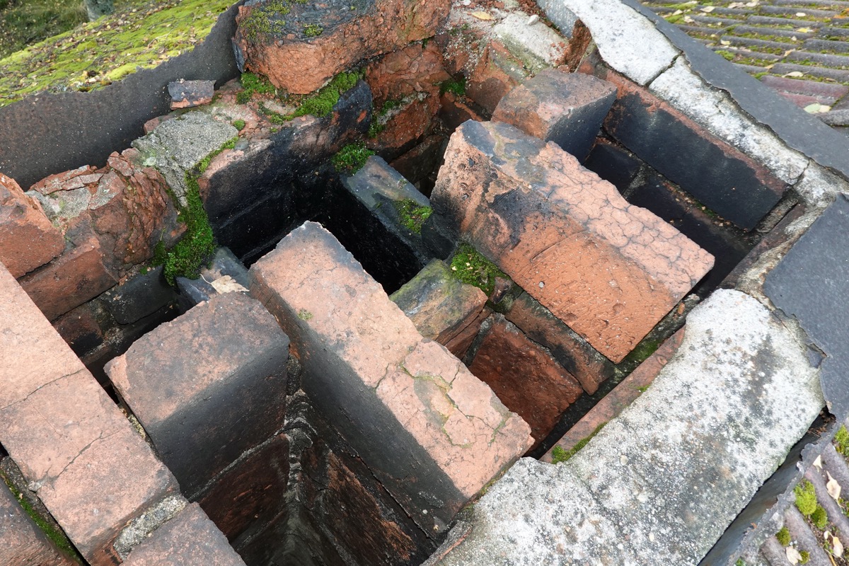 Cracked chimney crown allowing water into the masonry stack