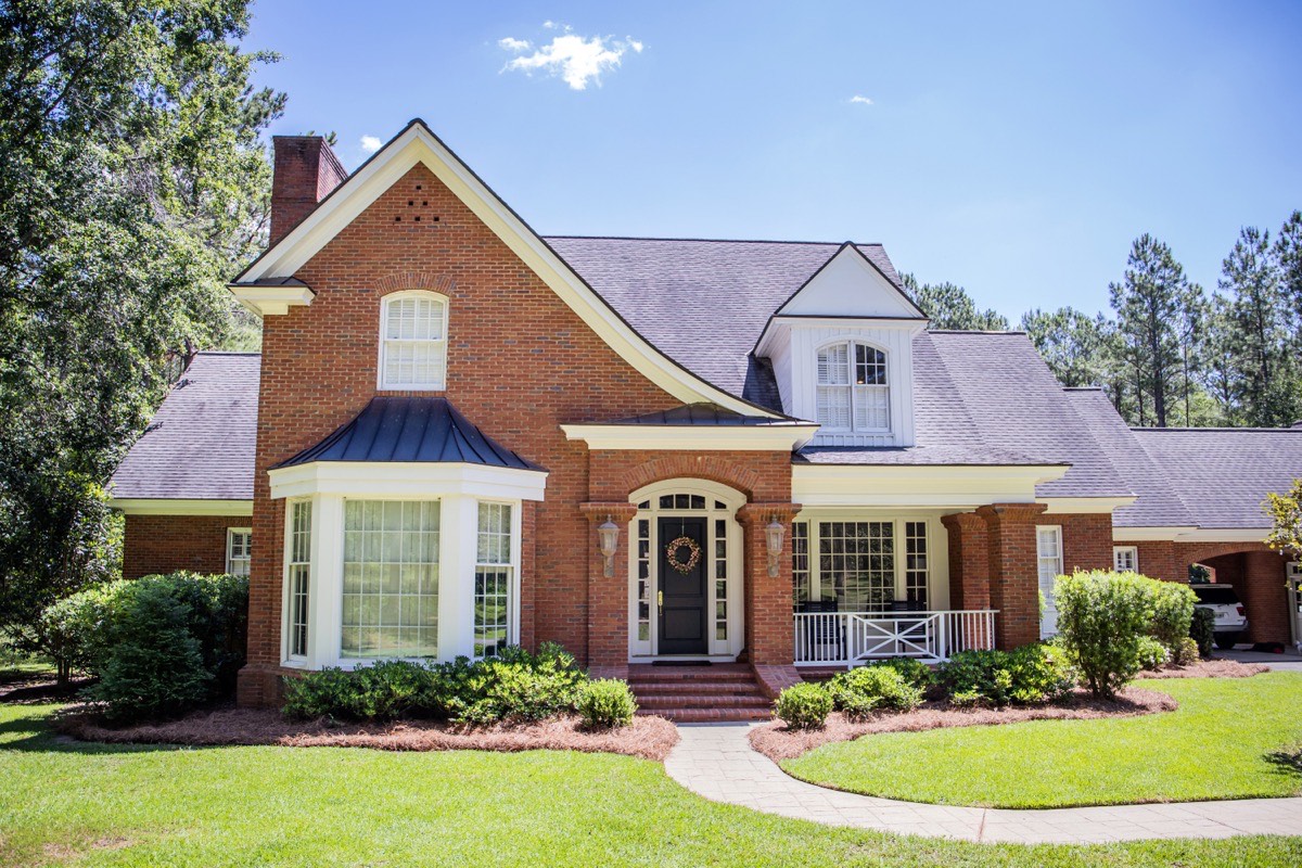 Craftsman and Colonial Revival houses with masonry porch piers along Frederick Road in Catonsville, MD