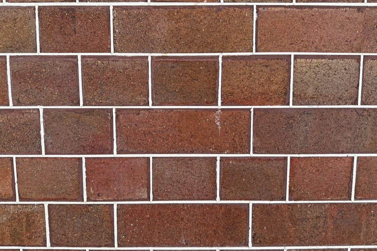 Close-up of a raked mortar joint packed with a lime-rich mix on historic Catonsville brick