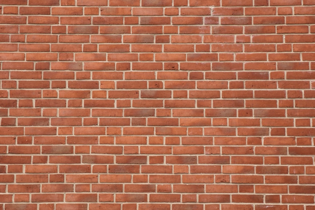 Close-up of a tooled mortar joint matched to 1930s Towson brickwork
